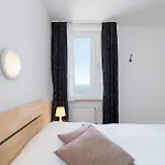 App 406 - Strandlage Lejlighed